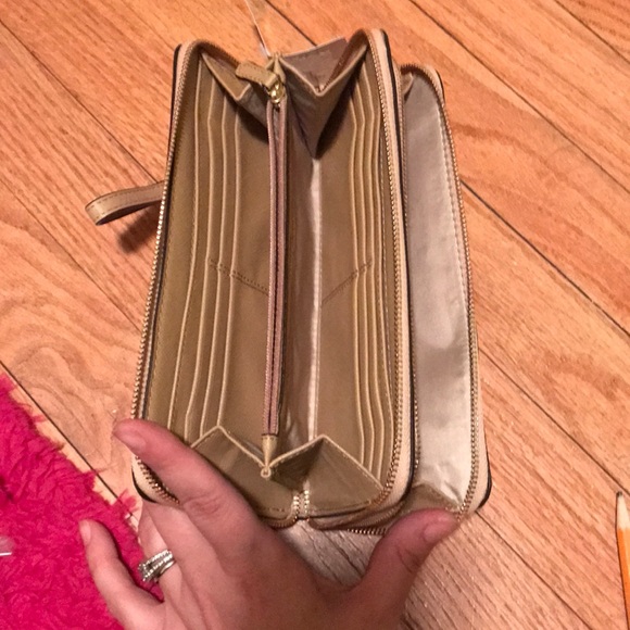 Brand new tan accordion style Coach wallet